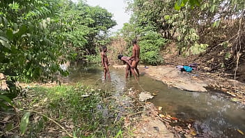 Curvy brown skinned ebony ready to be devored at the stream