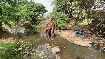 Curvy brown skinned ebony ready to be devored at the stream
