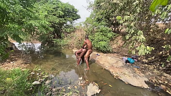Curvy brown skinned ebony ready to be devored at the stream