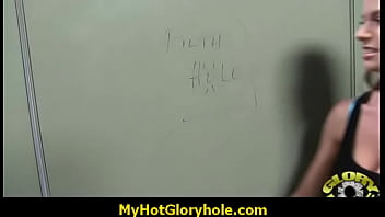 Sucking cock trough a gloryhole 1