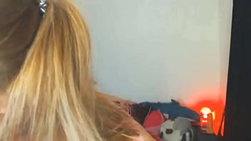 Shaking her huge boobs on cam