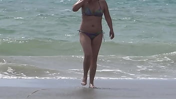 On the beach i please my friend and let her stepson cum in my pussy