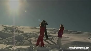 Members of the ski rescue patrol find a stranded skier and screw him