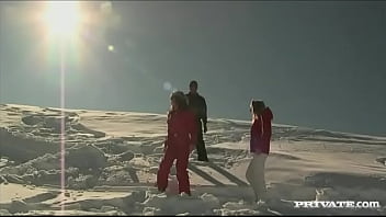 Members of the ski rescue patrol find a stranded skier and screw him