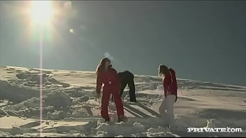 Members of the ski rescue patrol find a stranded skier and screw him