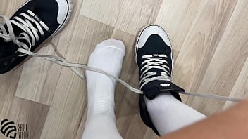 Footfetish in sneakers and socks