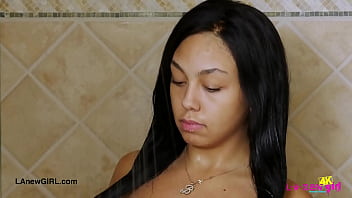 Gorgeous brunette enjoys a sensual bath