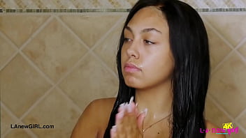 Gorgeous brunette enjoys a sensual bath