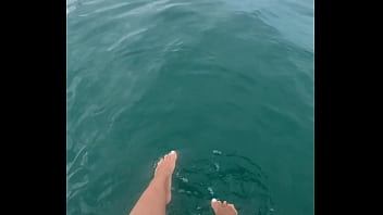 The warm sea water caresses my feet