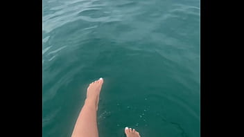 The warm sea water caresses my feet
