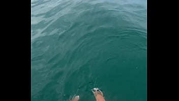 The warm sea water caresses my feet