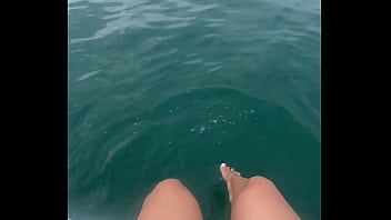 The warm sea water caresses my feet