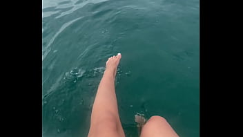 The warm sea water caresses my feet
