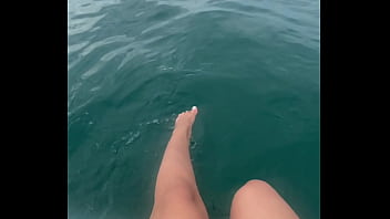 The warm sea water caresses my feet