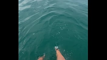 The warm sea water caresses my feet