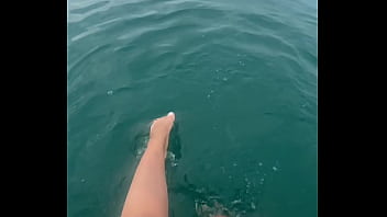 The warm sea water caresses my feet