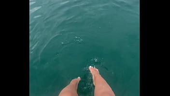 The warm sea water caresses my feet