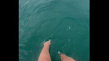 The warm sea water caresses my feet