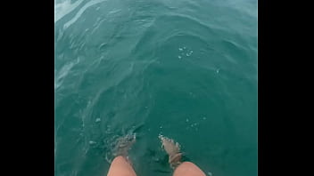 The warm sea water caresses my feet