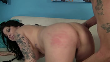 Tattoed brunette slut fuckend on a coach