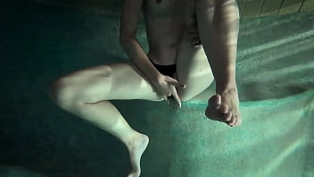 Petite slut wife fingers her pussy to orgasm in the pool