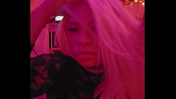 Sexy cat cleans and plays while wolf prowls