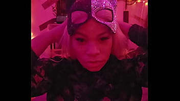 Sexy cat cleans and plays while wolf prowls