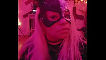 Sexy cat cleans and plays while wolf prowls