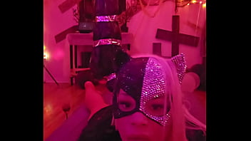 Sexy cat cleans and plays while wolf prowls