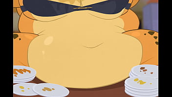 Giraffe stuffs herself in an all you can eat buffet