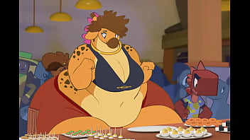 Giraffe stuffs herself in an all you can eat buffet