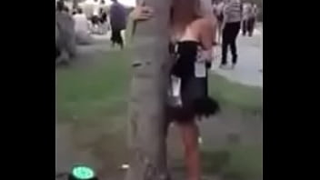 Girl kissing tree