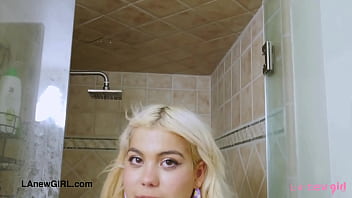 Pretty blonde model enjoys sensual bath