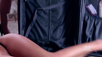 Hand submissive brunette babe stored in suitcase