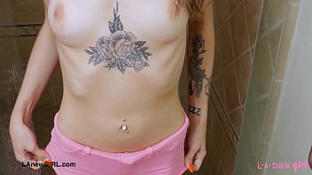 Attractive teen model enjoys a sensual bath