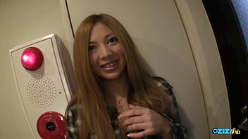 A red haired individual has her hands soiled in public