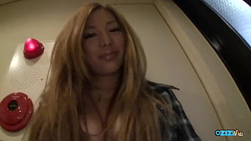 A red haired individual has her hands soiled in public