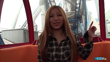 A red haired individual has her hands soiled in public