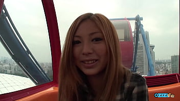 A red haired individual has her hands soiled in public