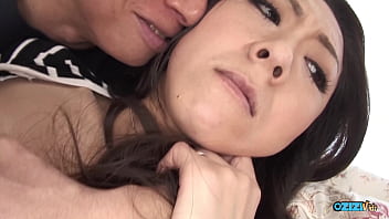 An asian individual is expelling a fine stream of fluids while indulging in many joys