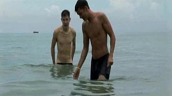 Two Hunks Play On The Beach Before Jerking Off thumbnail