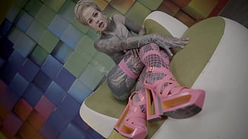 Heavily tattooed teen anal stretching