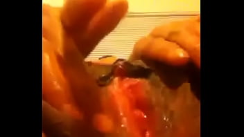 Redbone fingering her pretty pussy Redbone fingering her pretty pussy