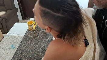 A stepdaughter is surprised while having breakfast