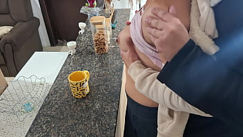 A stepdaughter is surprised while having breakfast