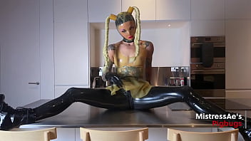 Pigbugs latex doll and pig squirting on the countertop