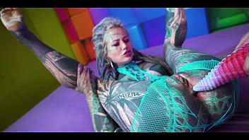 Strapped up with a giant toy ready to wreck that ass completely