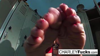 Busty brunette has some foot fetish fun