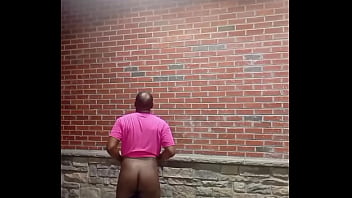 A private strip tease for free while faced backwards in 70 degree weather