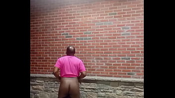 A private strip tease for free while faced backwards in 70 degree weather